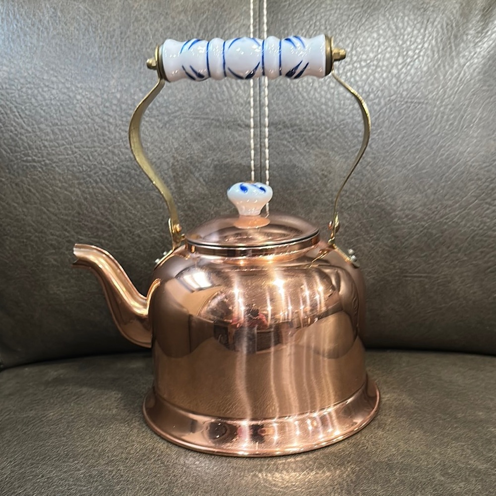 Elegant Copper Teapot with Blue Accents